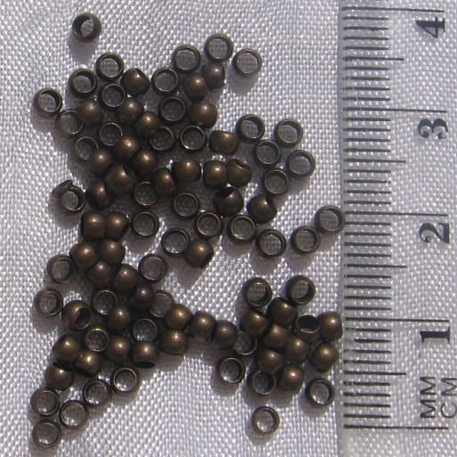 J147.2000- LOT DE 2000 PERLES RONDES À ÉCRASER...